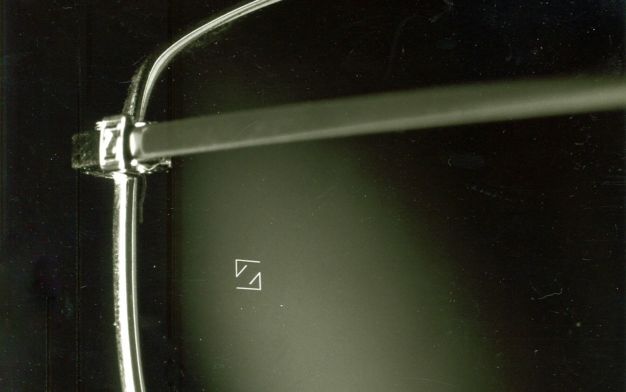 Introduction of the &quot;Z&quot; trademark on all eyeglass lenses.