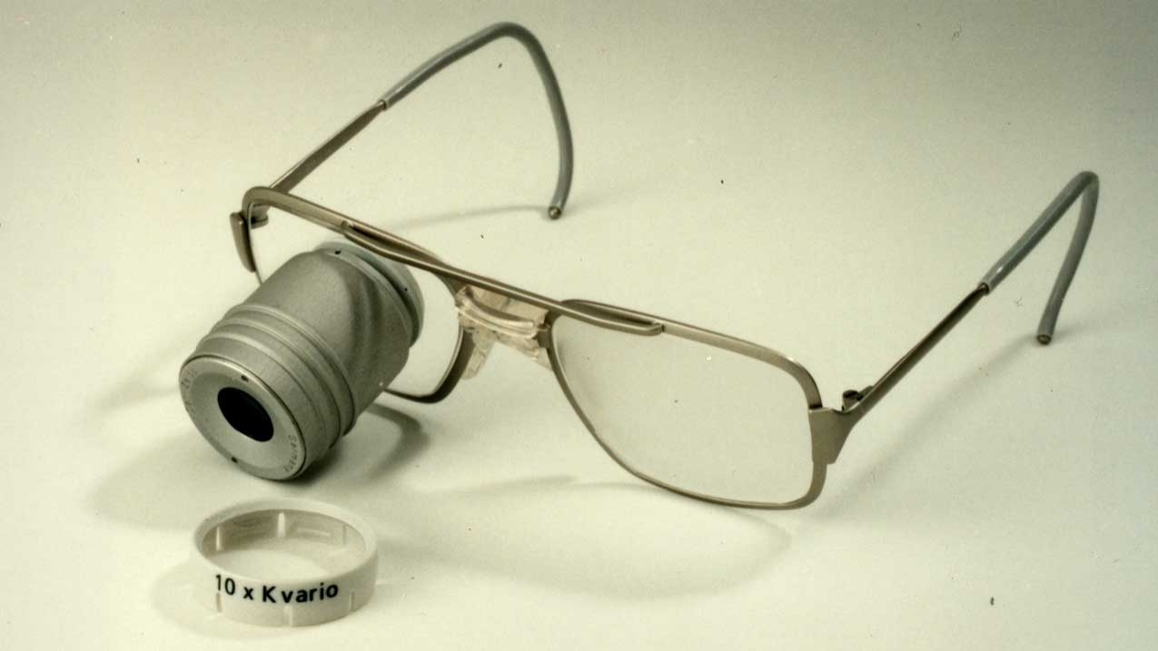 A magnifying visual aid with 3.8x telescopic magnification based on the Keplerian telescope