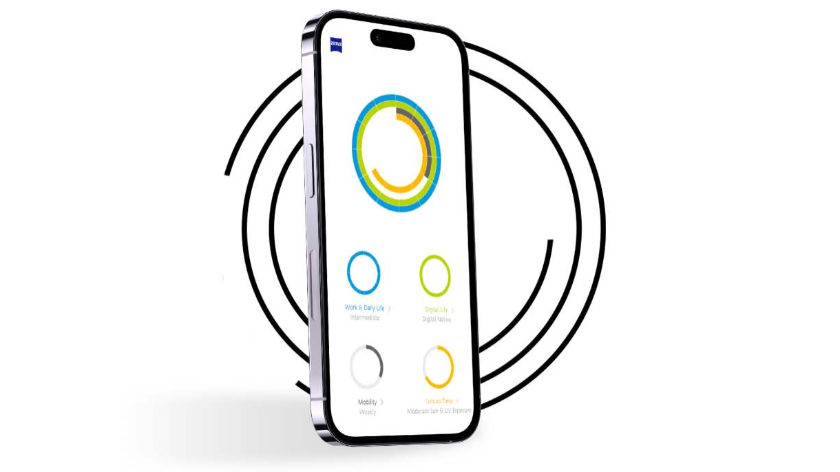 A smartphone in front of black rings shows the vision profile of a My Vision Profile user with different-color rings. 