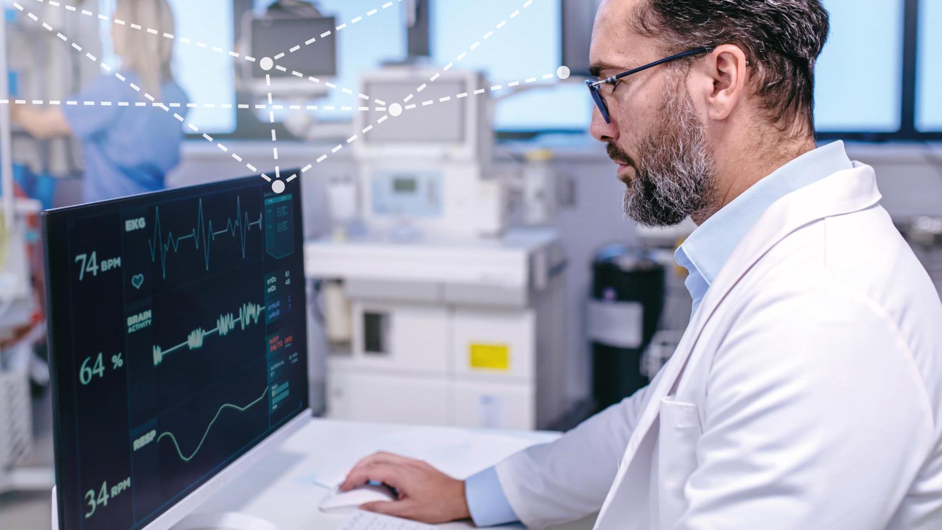 A doctor in a white lab coat analyzes patient vital signs on a high-resolution monitor in a modern medical facility, with ZEISS technology integrated into the environment.
