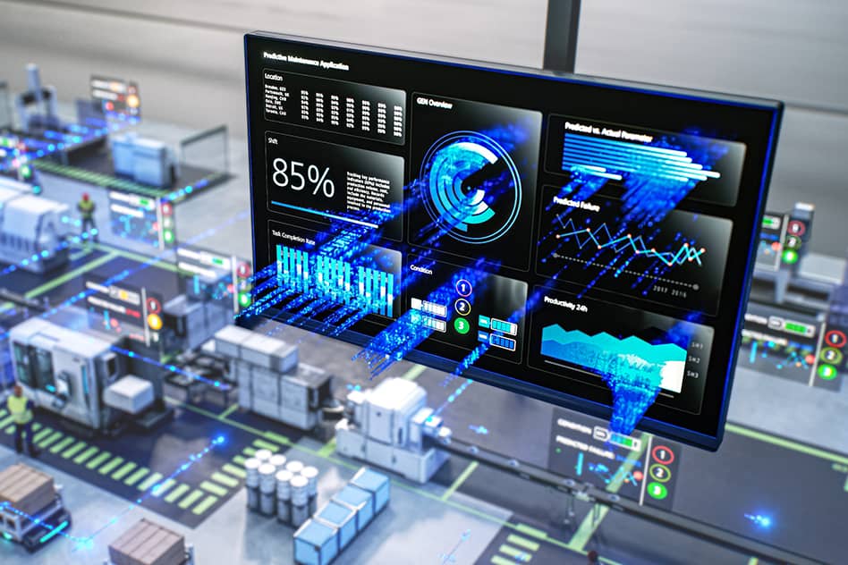 Two engineers in a high-tech manufacturing facility review data on a digital tablet surrounded by computer screens displaying technical 3D models and machinery designs.