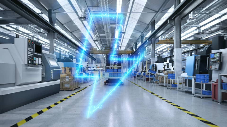 Modern industrial factory with advanced machinery and a glowing blue logo overlayed in the center of the production floor.