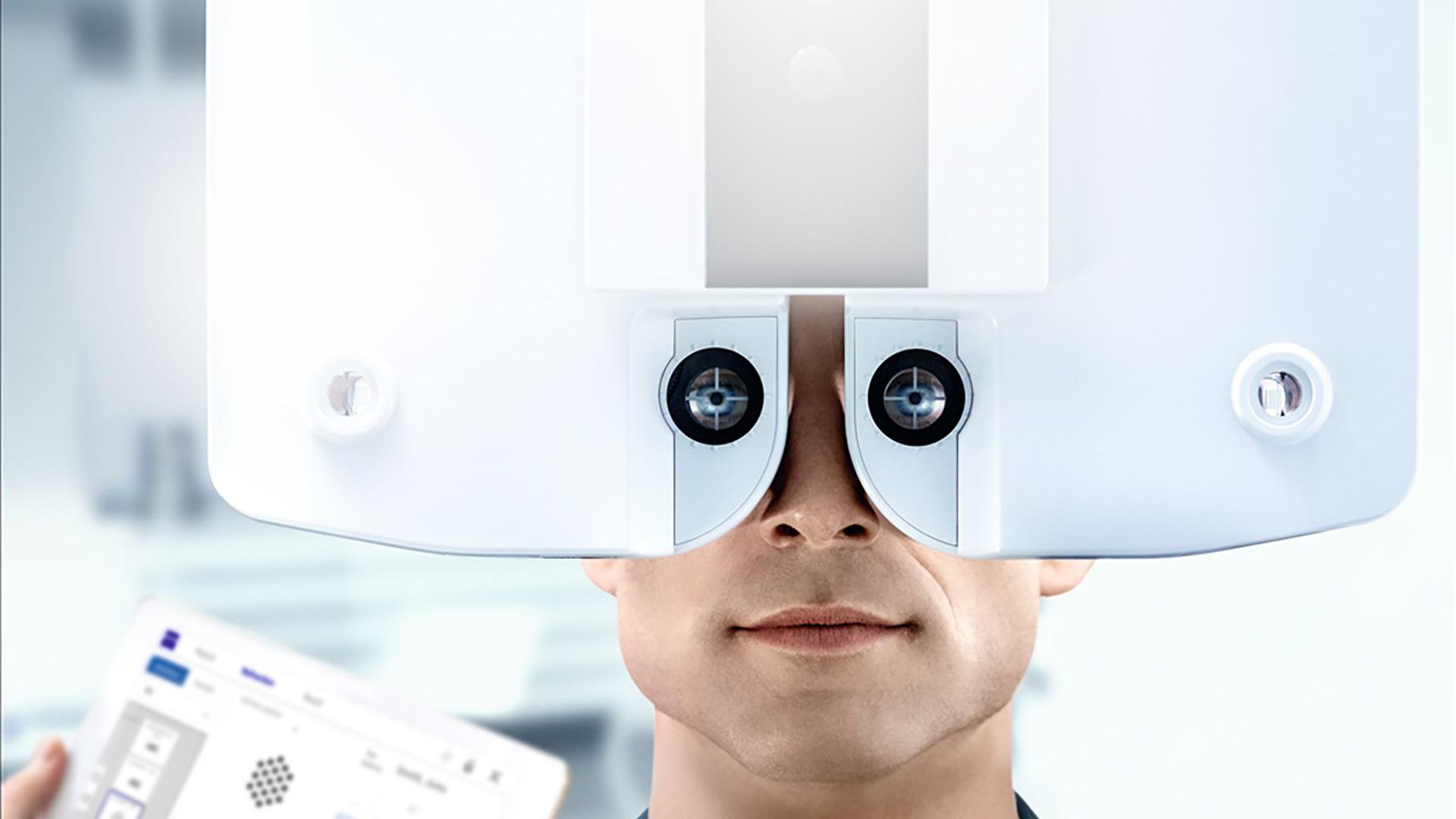 Ophthalmologist measuring visual acuity.